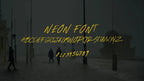 Neon Hand Drawn Font by moonbear.shop, featuring vibrant, glowing neon-style lettering on a dark background.